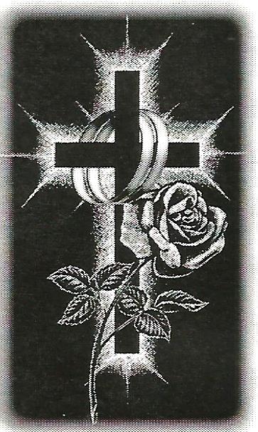 a cross with a rose and wedding rings on it