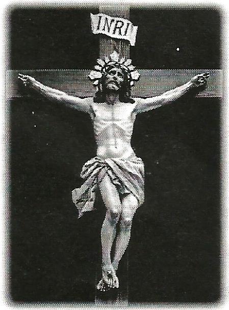 a black and white photo of jesus on the cross