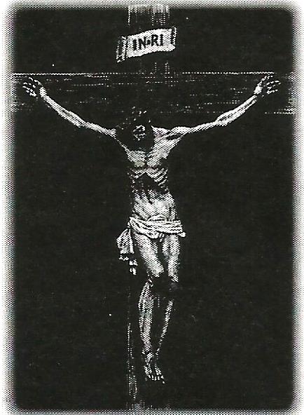 a black and white photo of jesus on the cross