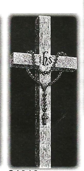 a black and white photo of a cross with jesus on it .