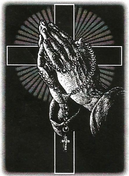 a pair of praying hands with a rosary in front of a cross .