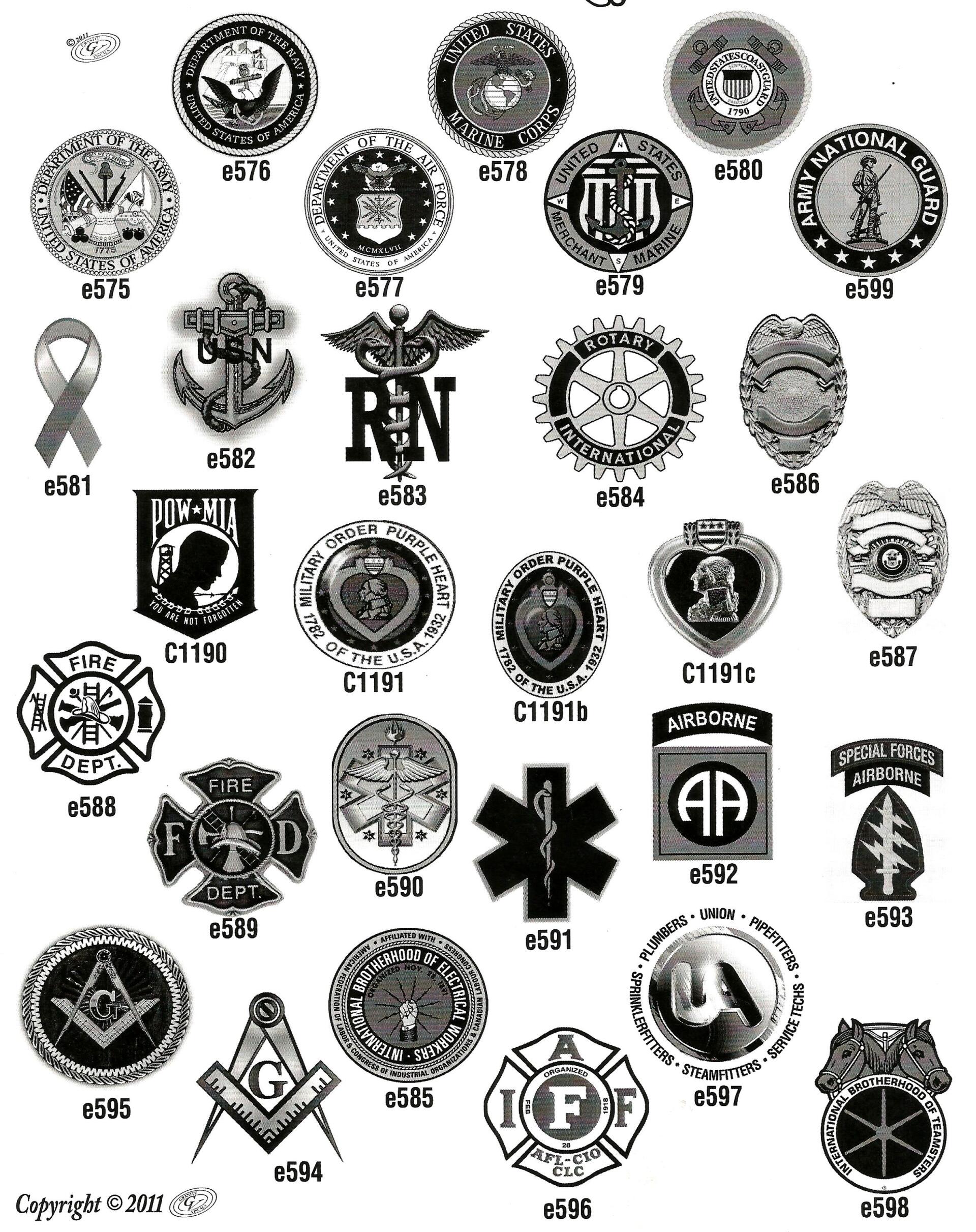 a black and white photo of a variety of badges and emblems .