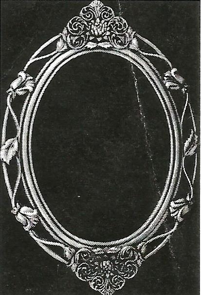 a black and white drawing of an ornate oval frame
