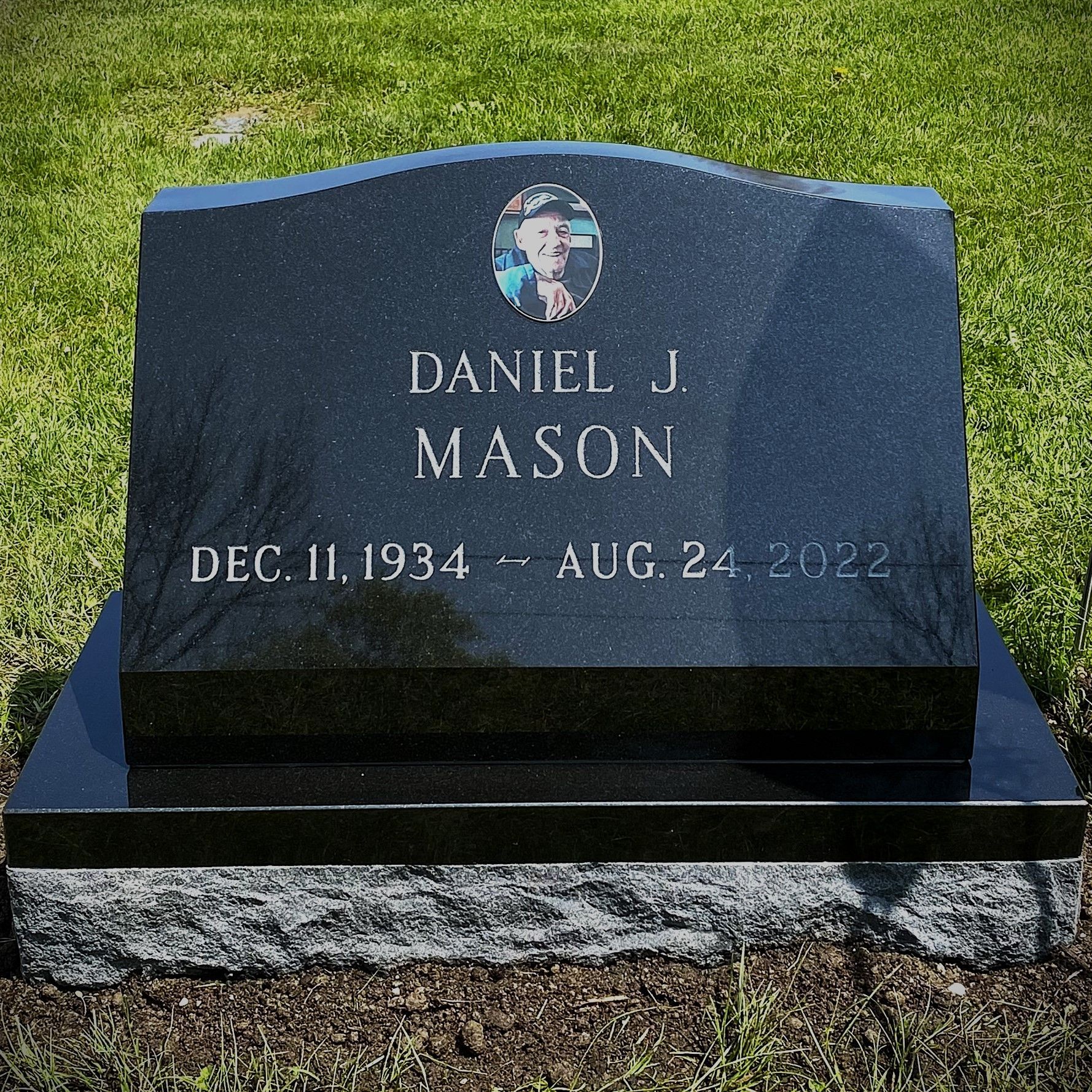 granite slant monument installed by Champlain Monuments