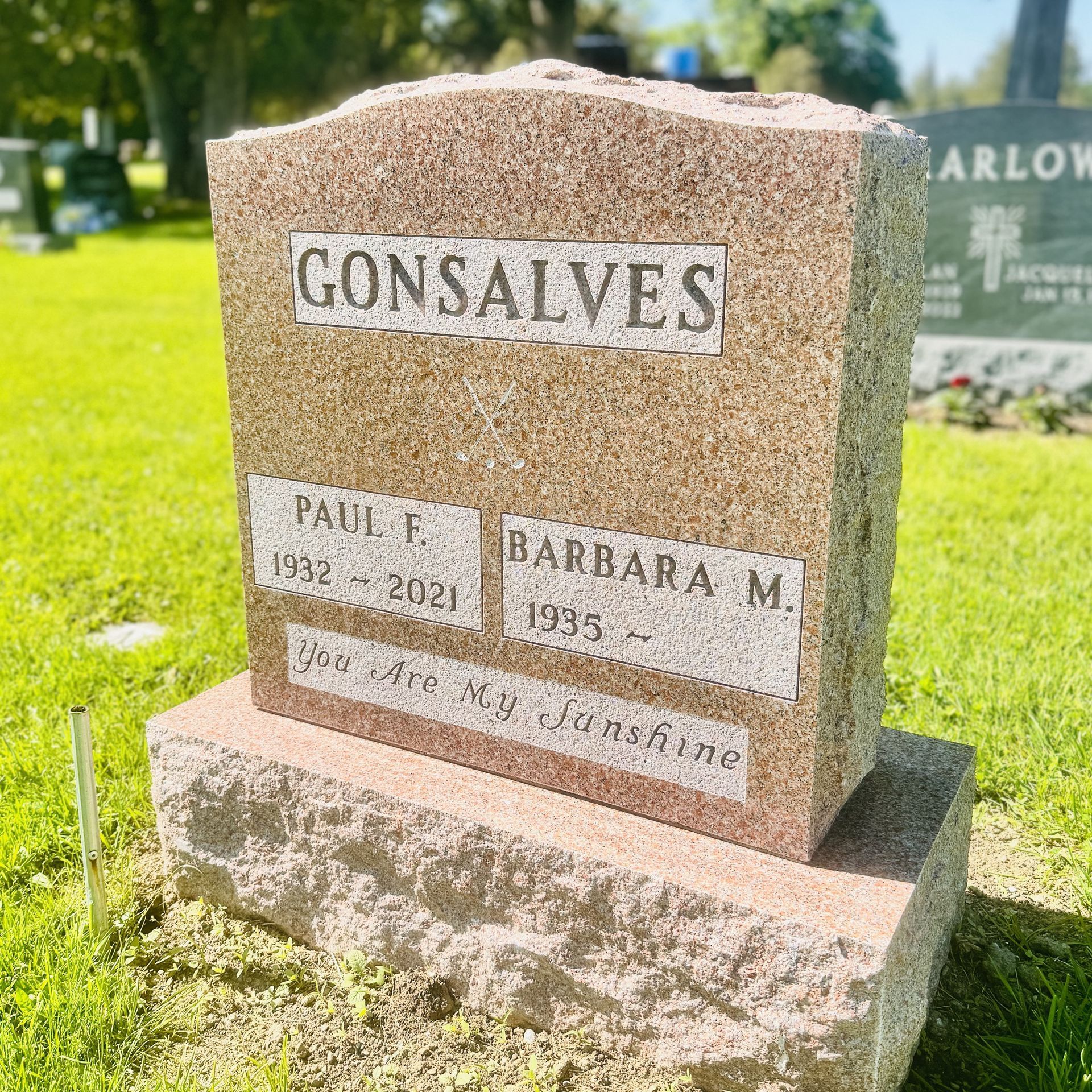 Mountain Rose Granite headstone from Champlain Monuments.