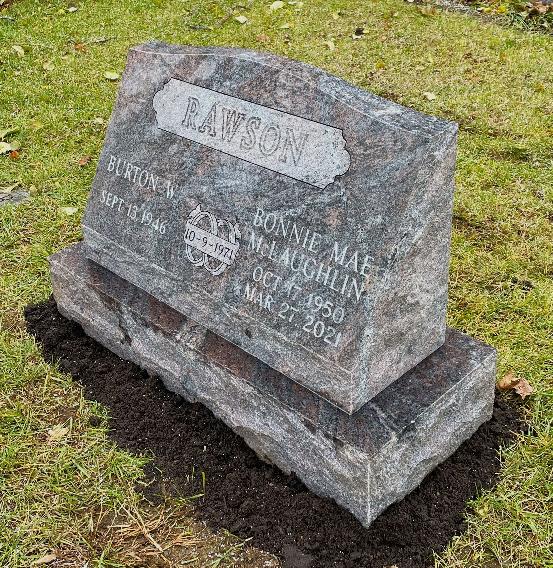 Paradiso granite slant monument installed by Champlain Monuments