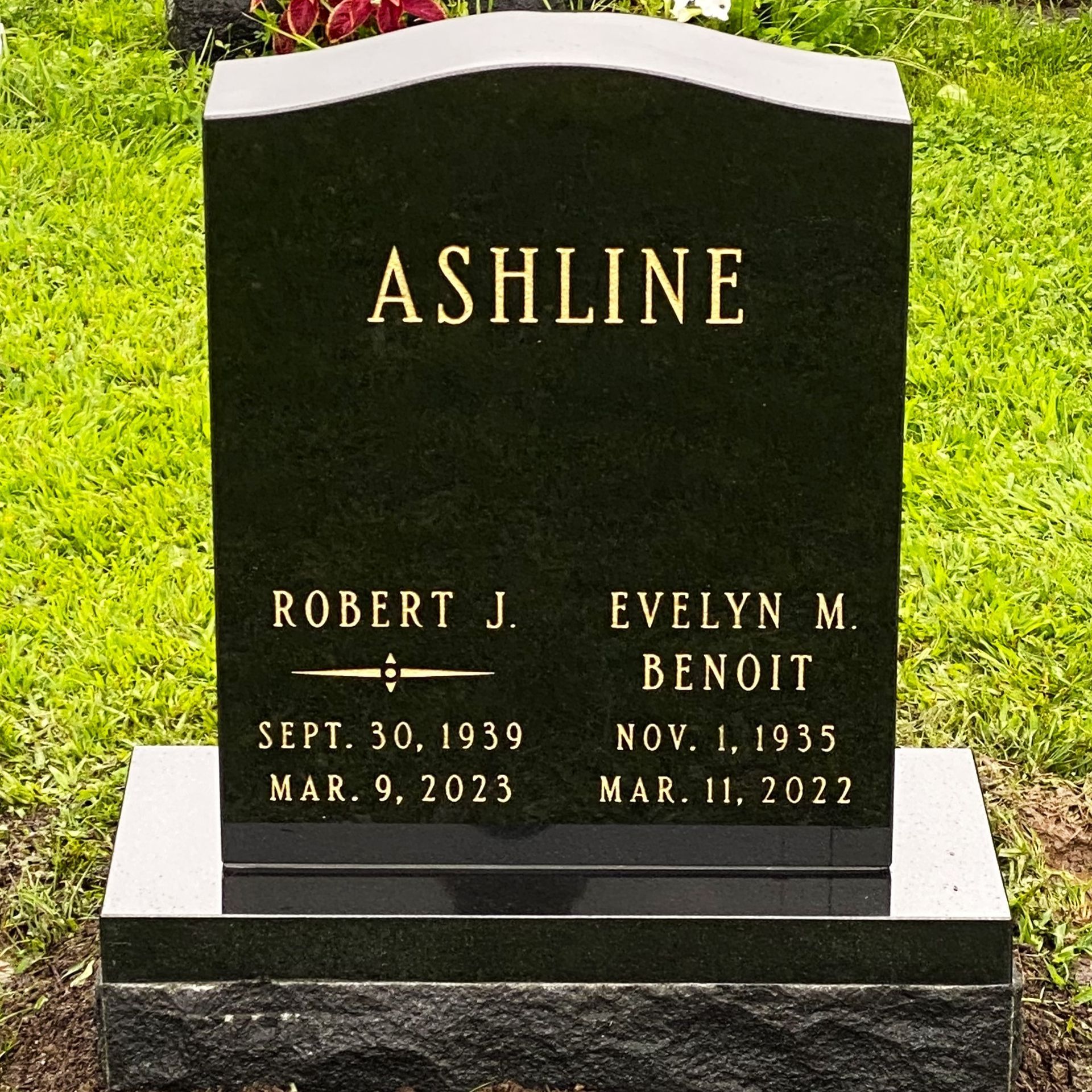 Black granite memorial by Champlain Monuments