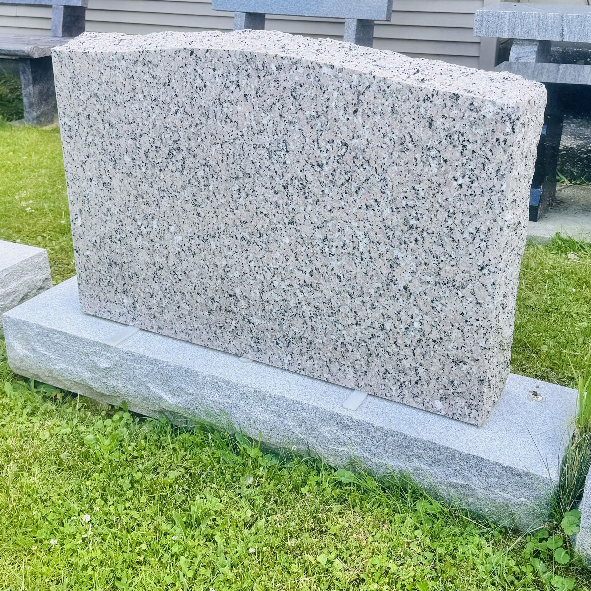 Cheap headstone at Champlain Monuments.