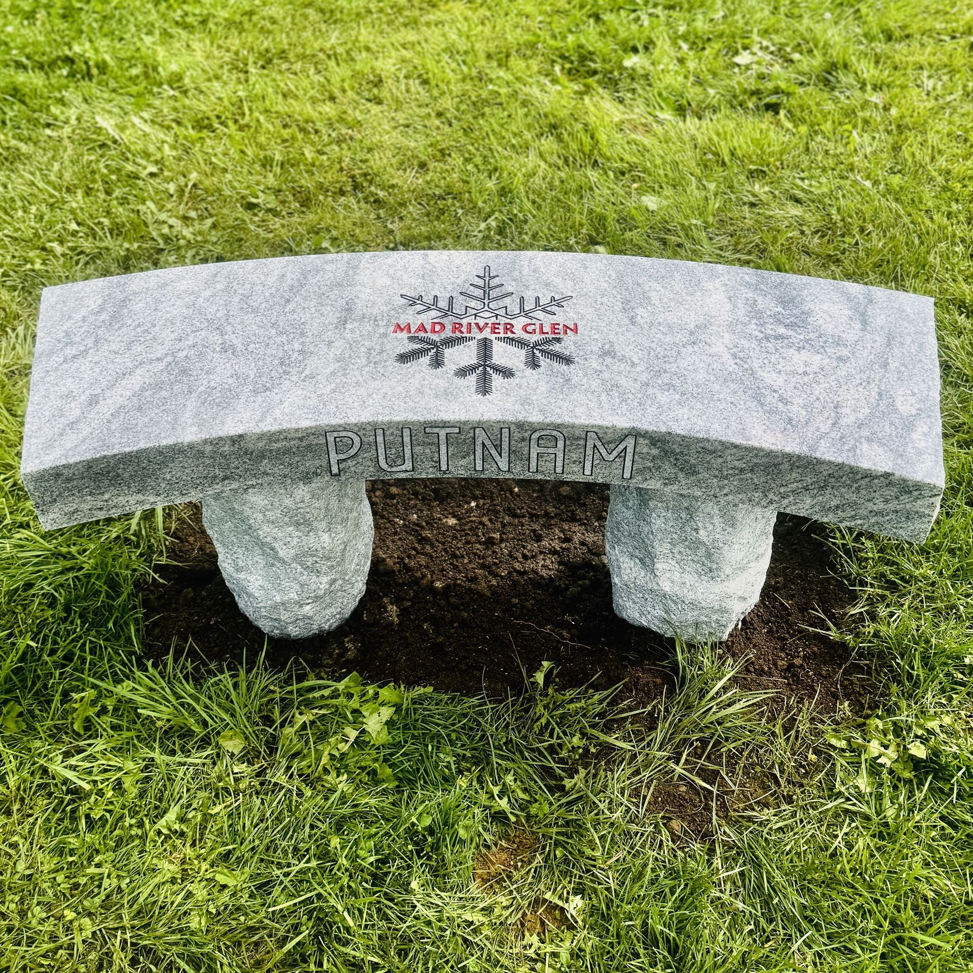 Custom granite bench installed by Champlain Monuments.