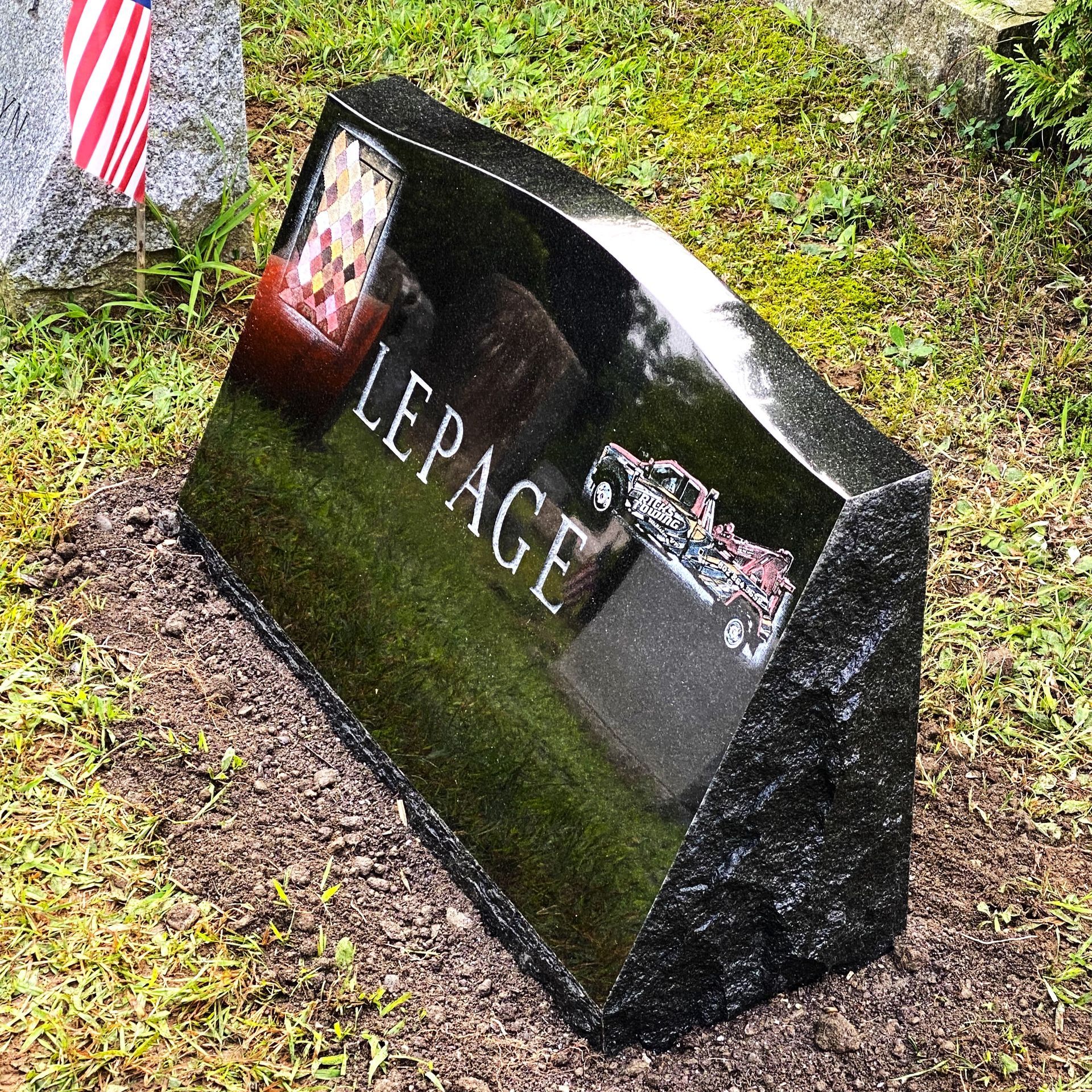 granite slant monument installed by Champlain Monuments