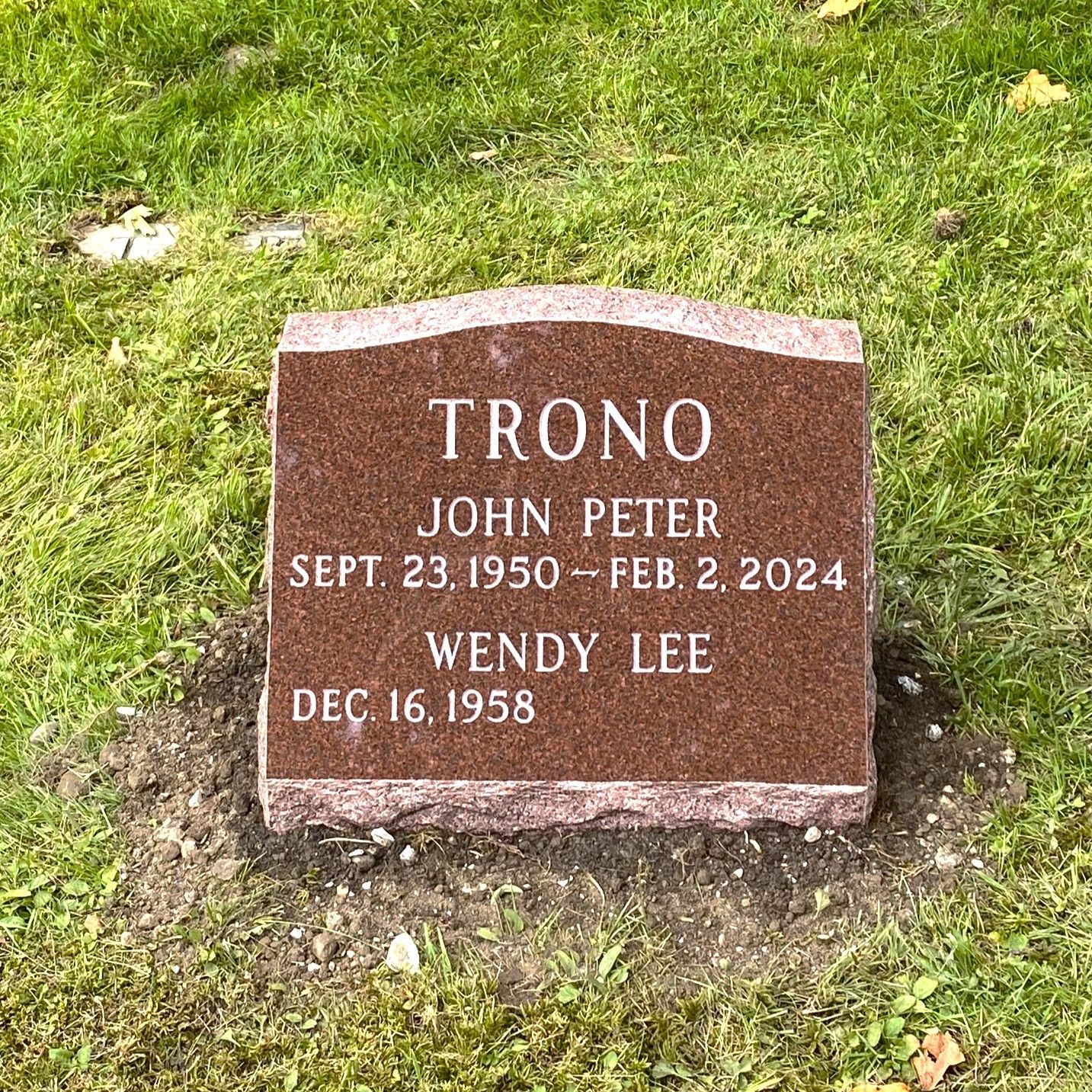 granite slant monument installed by Champlain Monuments