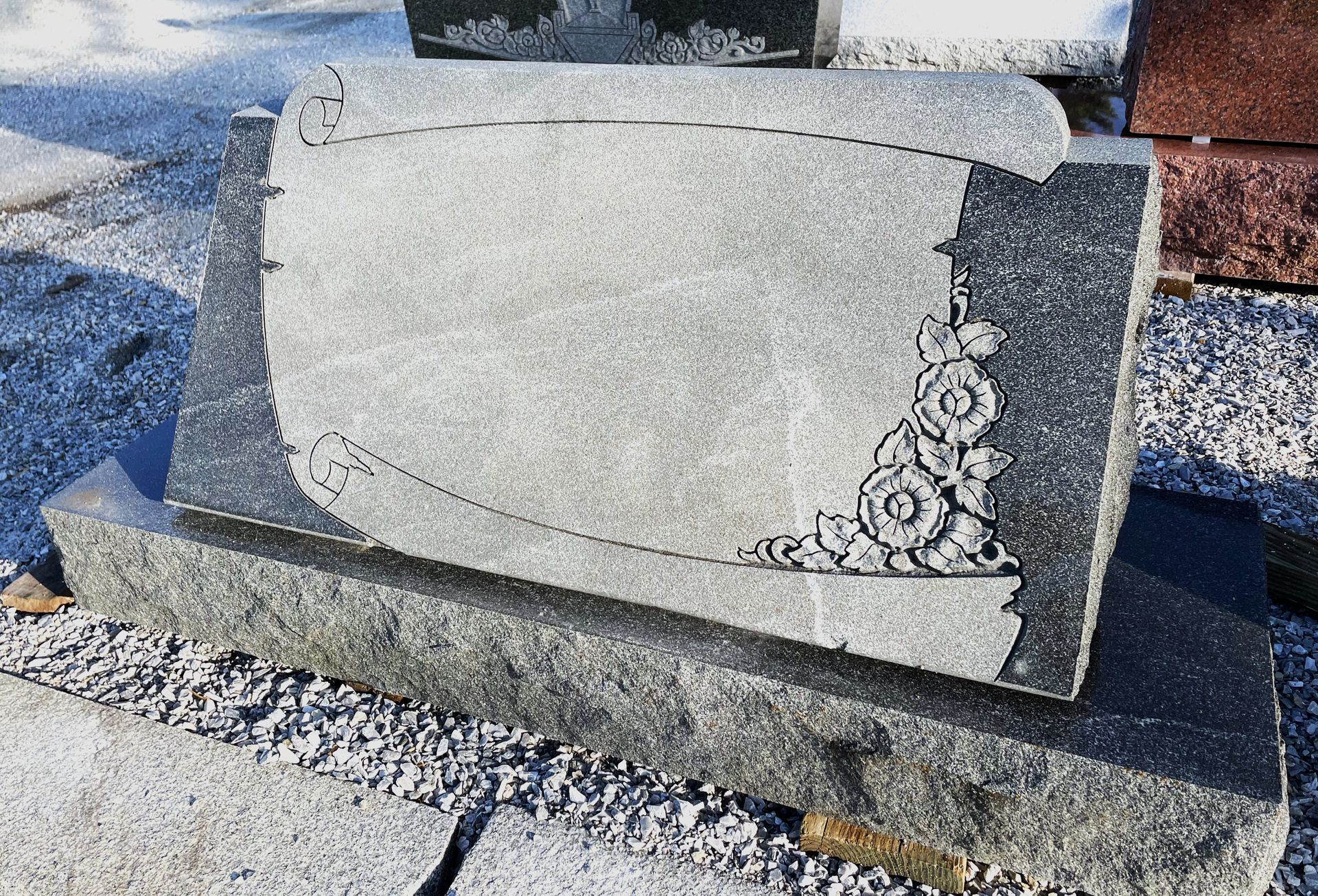 granite slant monument installed by Champlain Monuments