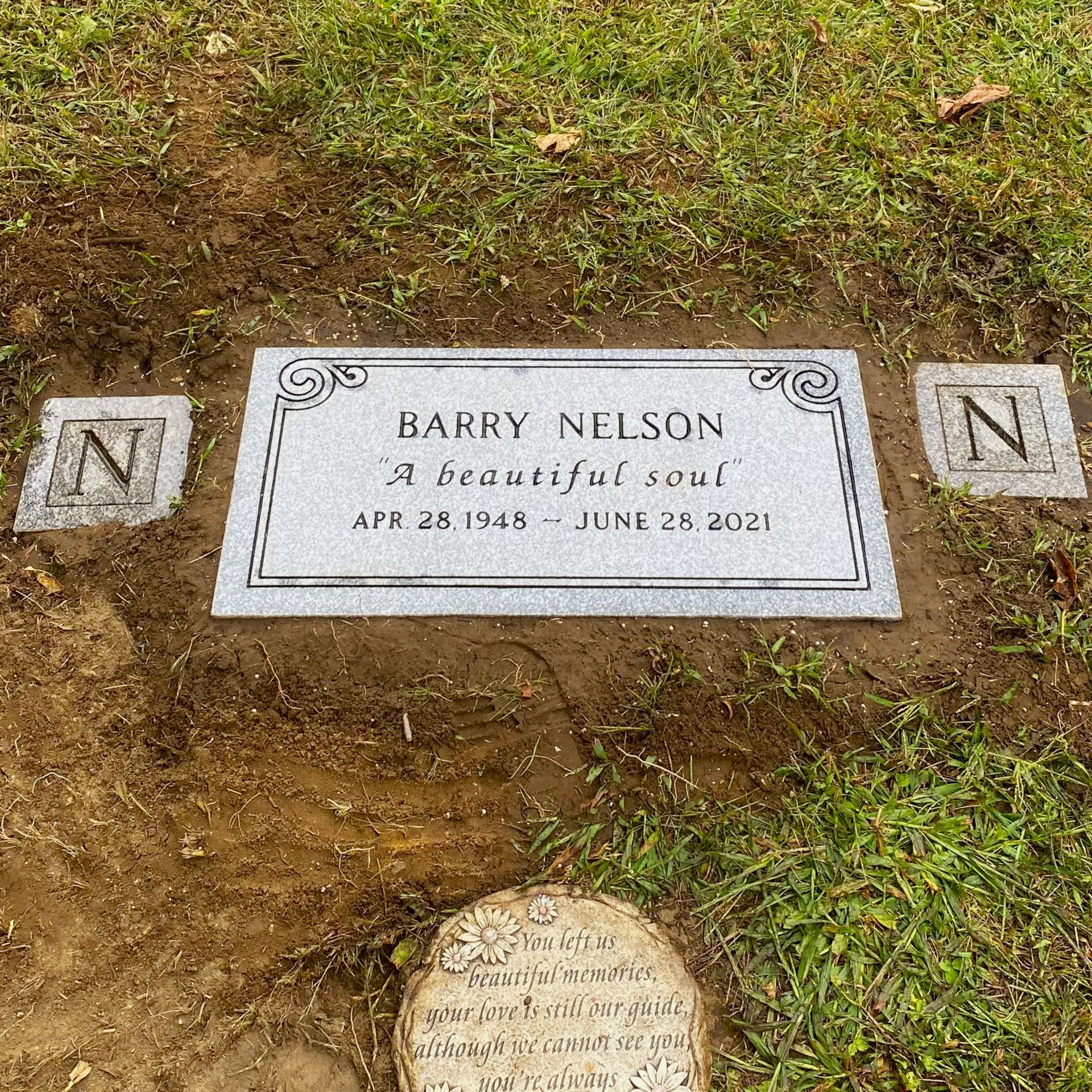 Flush marker installed by Champlain Monuments