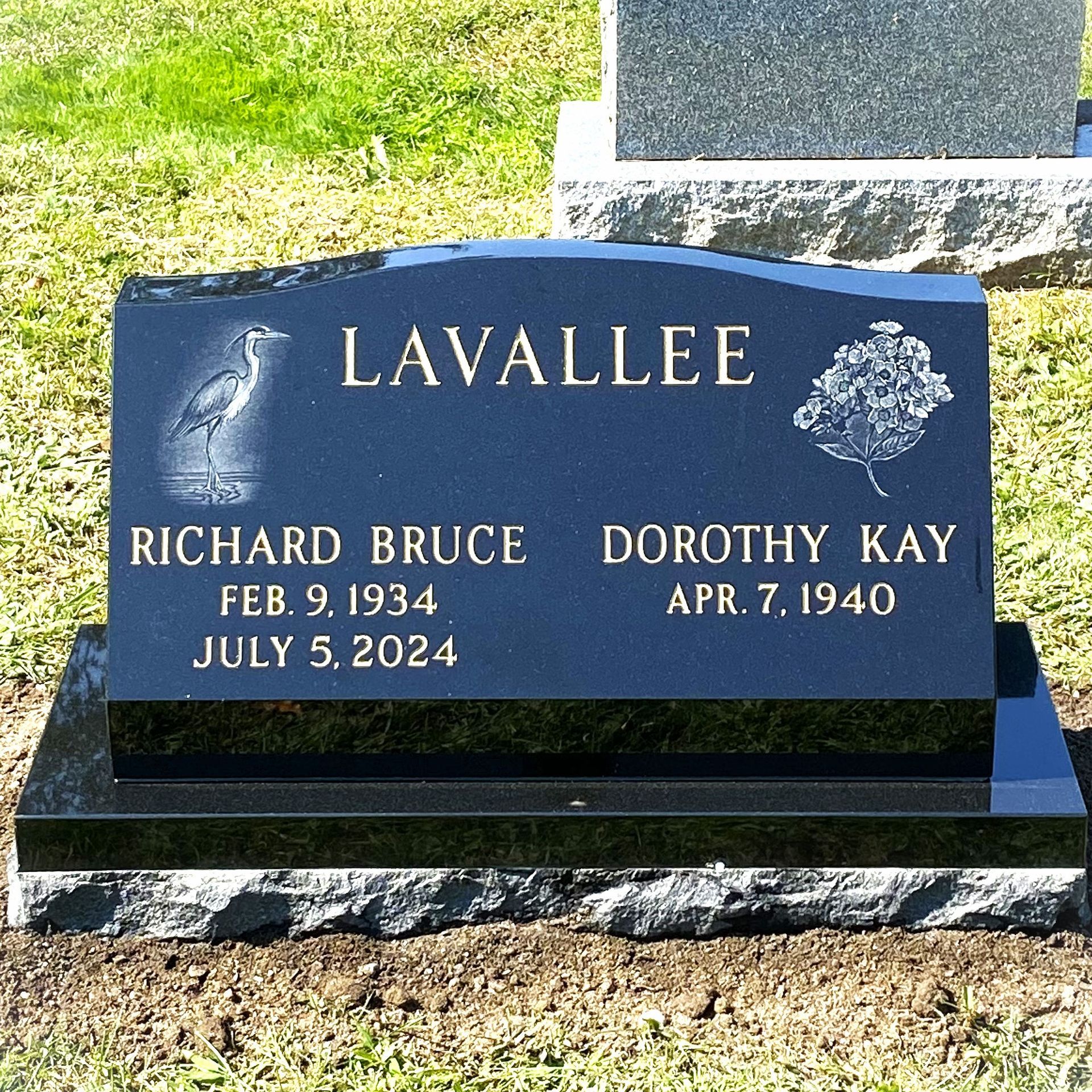 double grave slant monument installed by Champlain Monuments