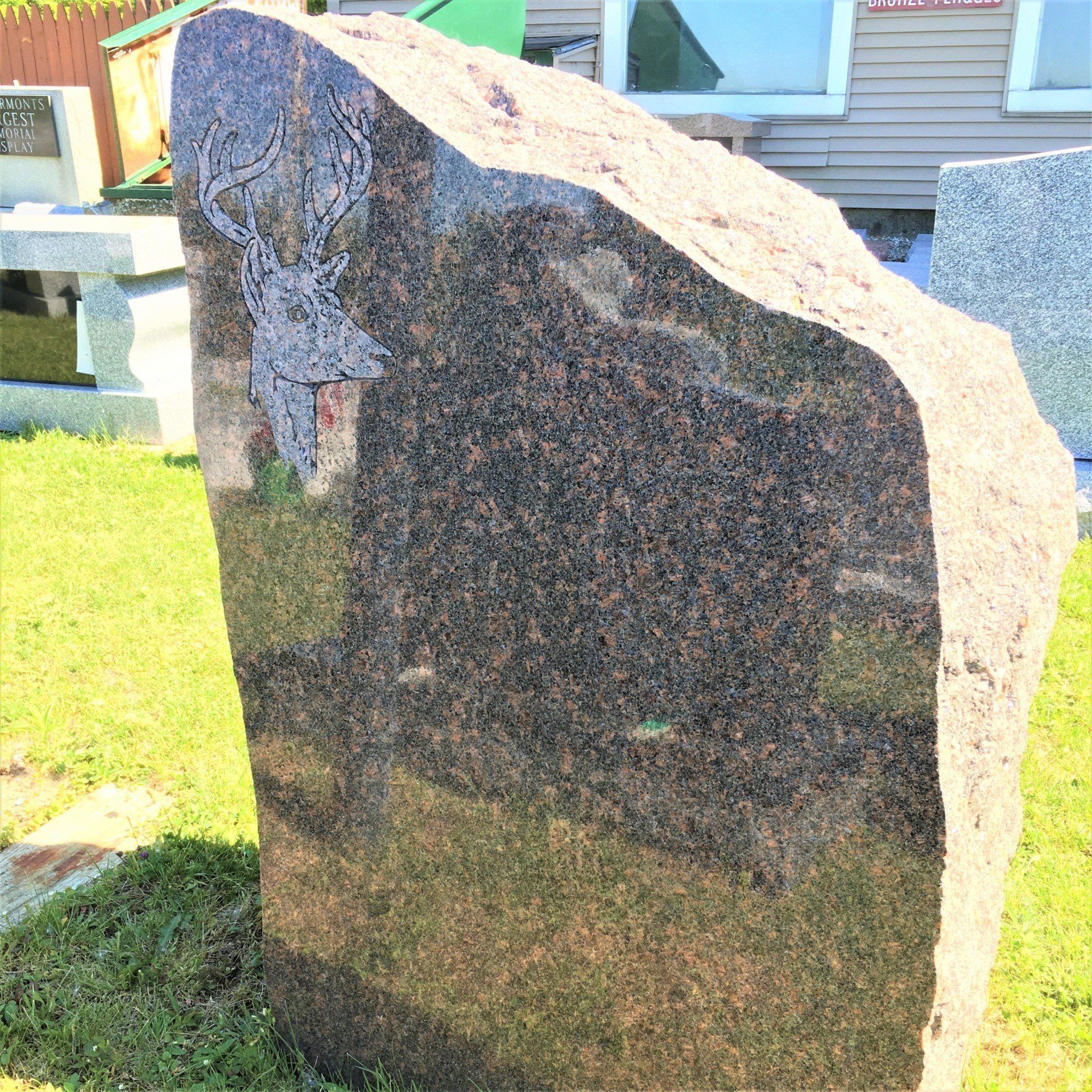 Boulder shaped monument; Granite Signs