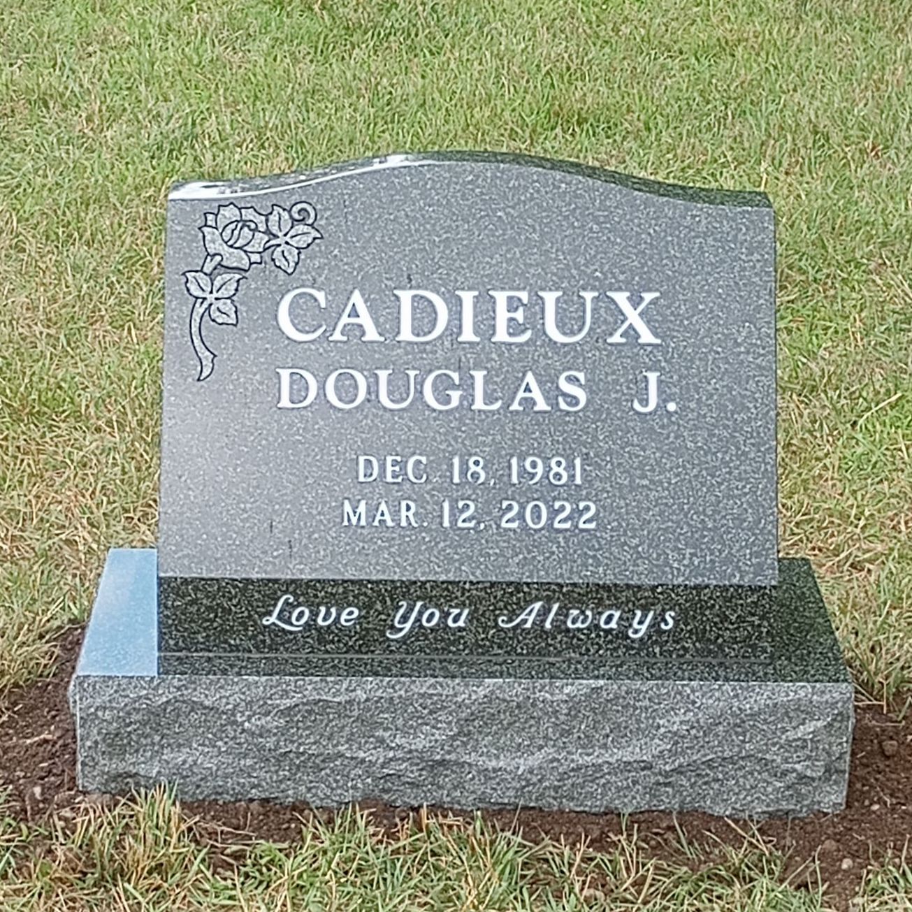 granite slant monument installed by Champlain Monuments