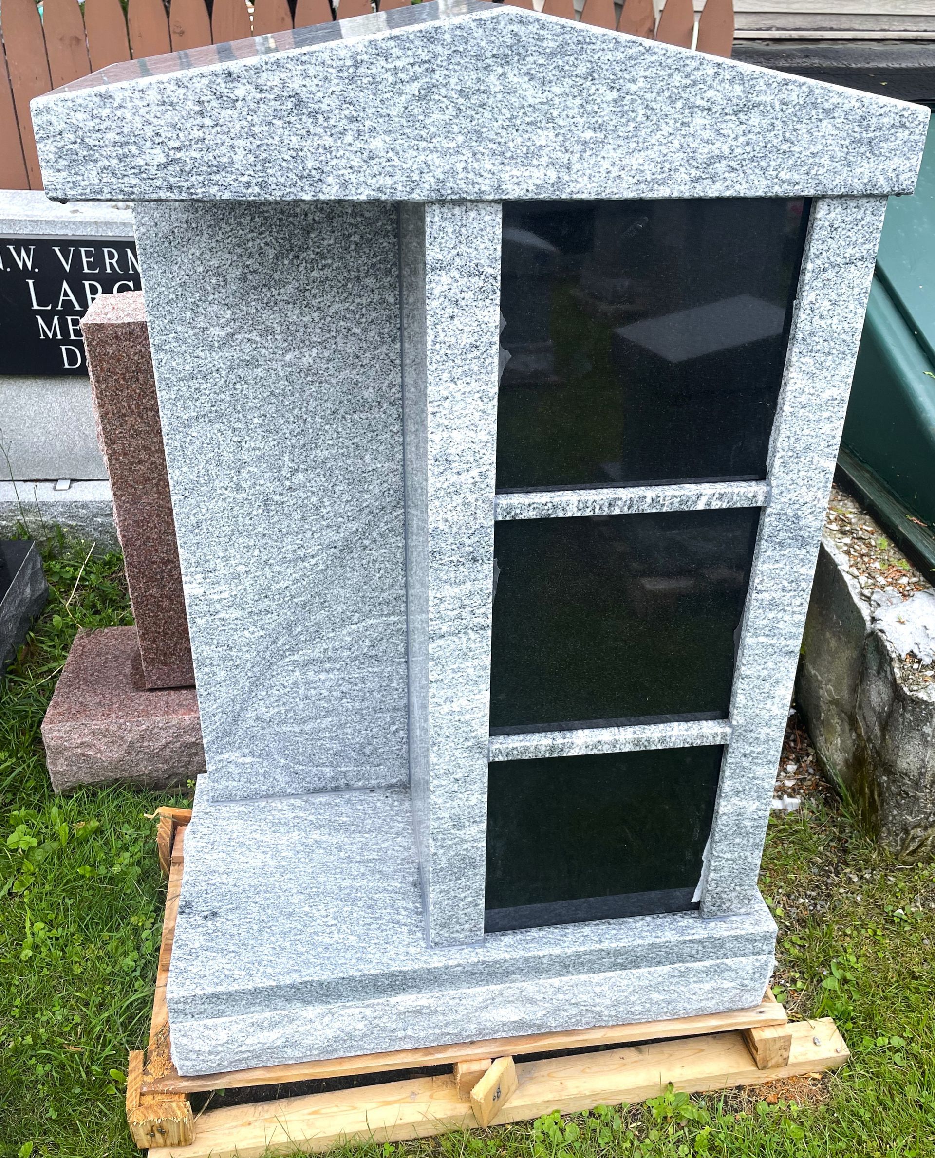 A 3-niche cremation monument at Champlain Monuments.