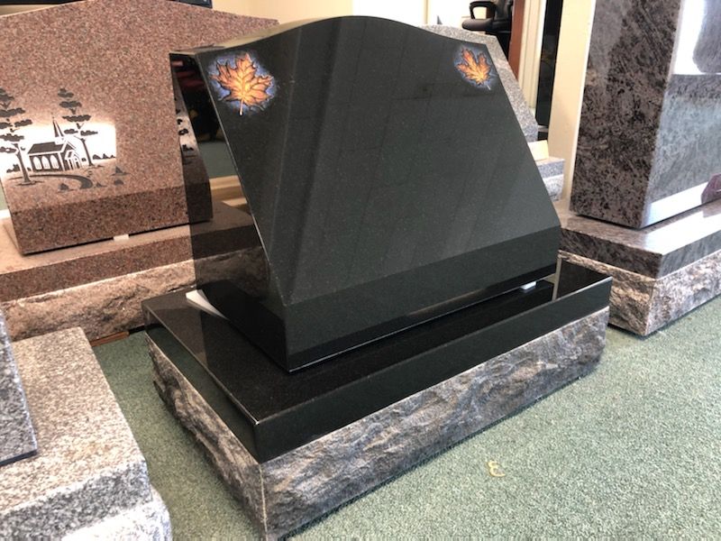 granite slant monument installed by Champlain Monuments