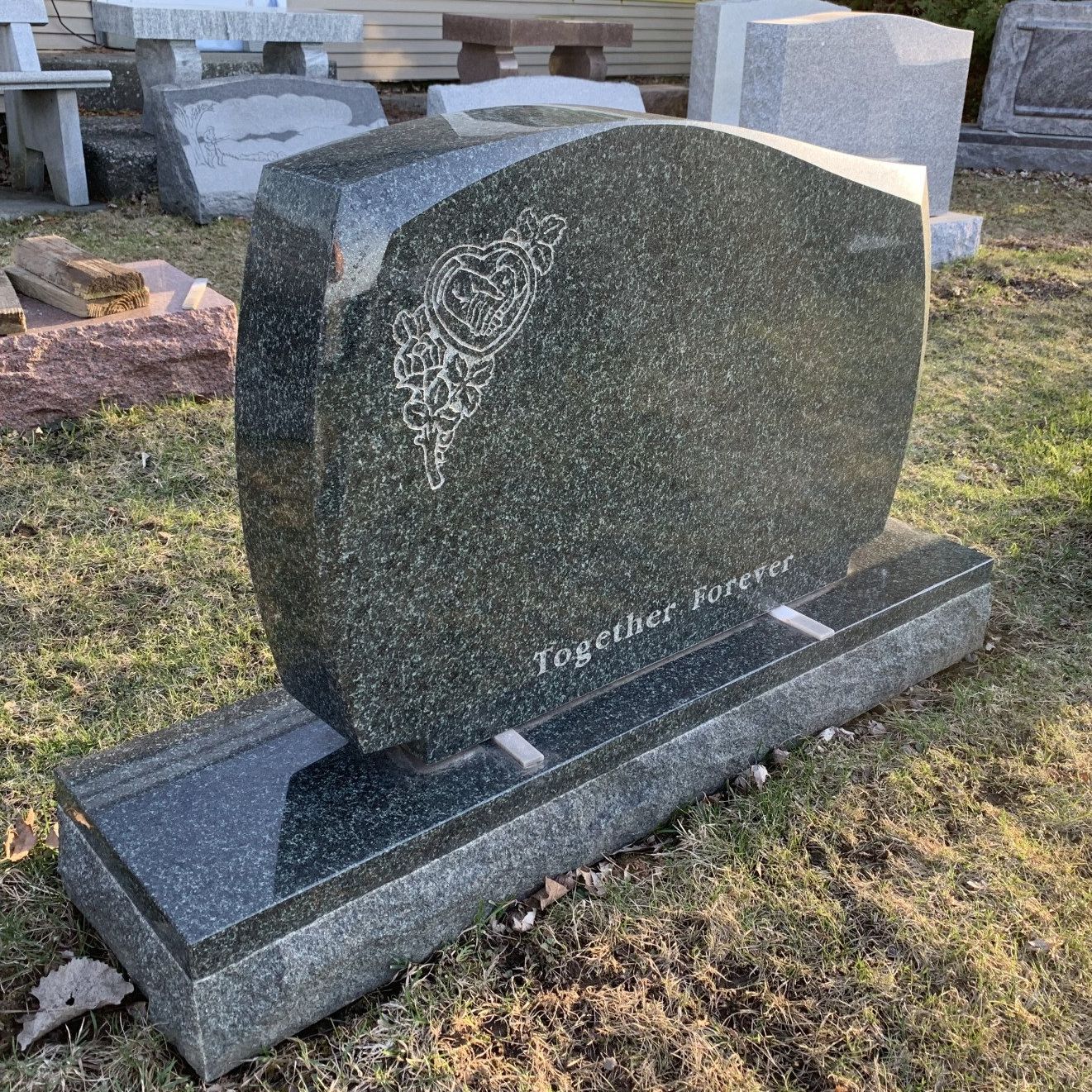 green granite gravestone