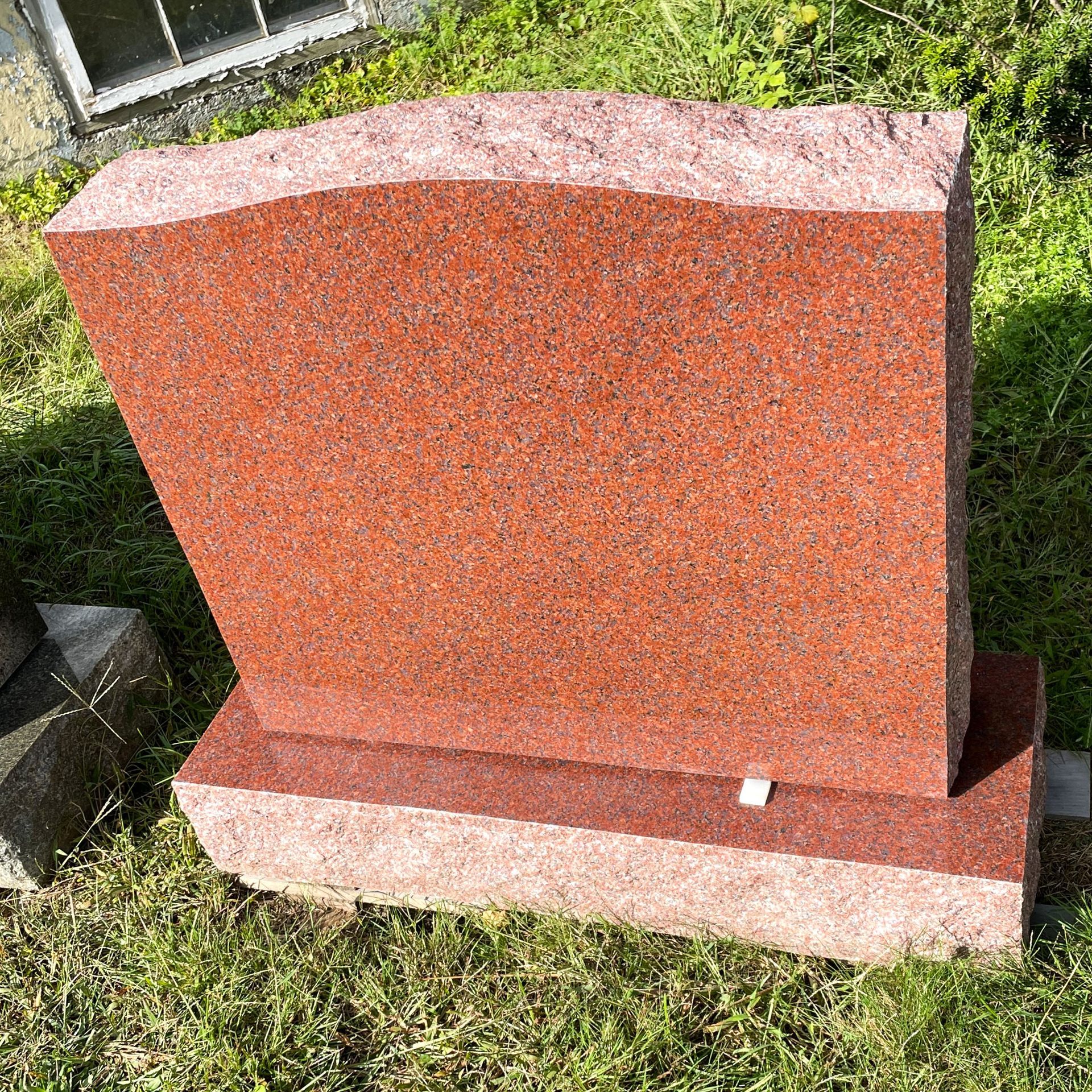 Red granite monument
