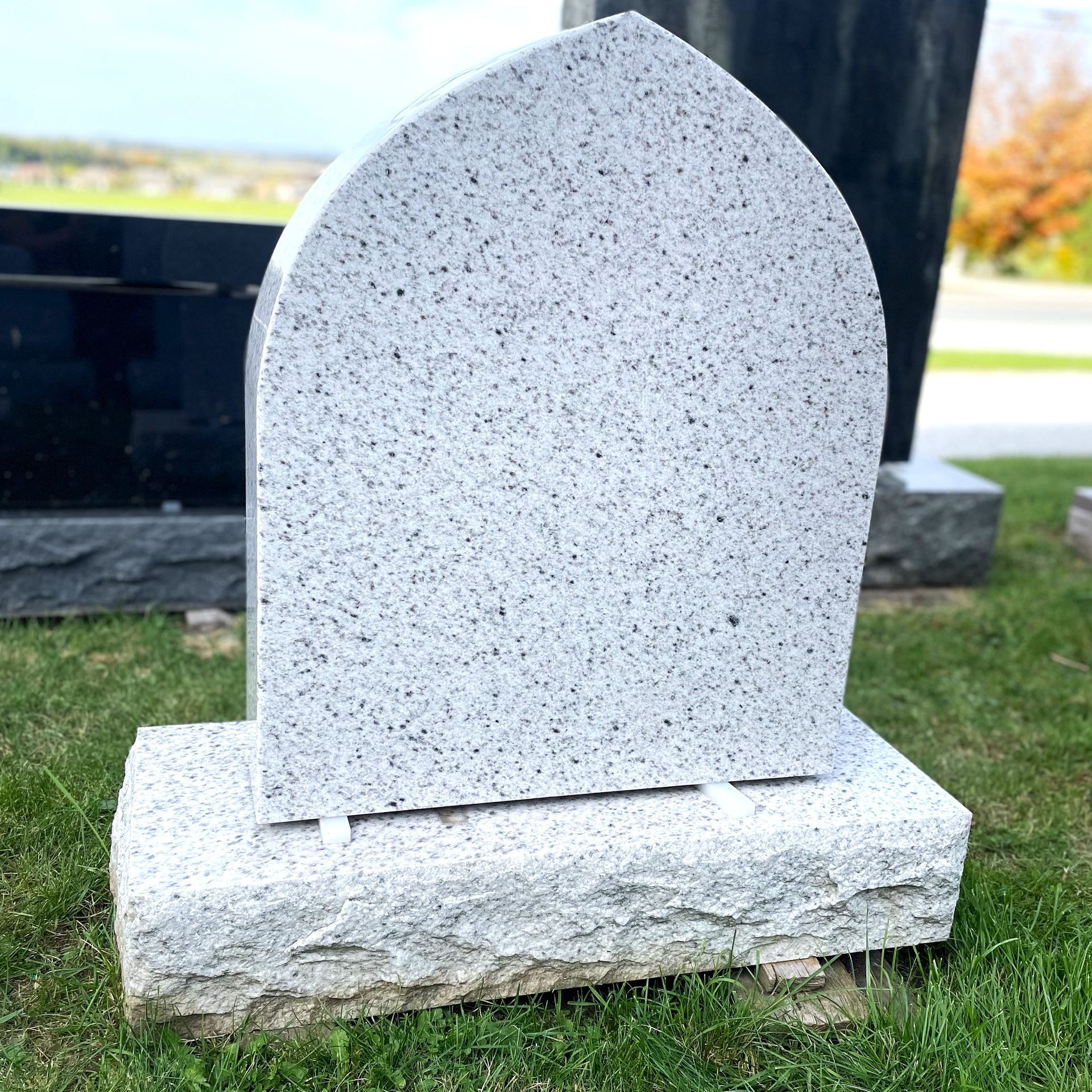 Bethel White Granite headstone.