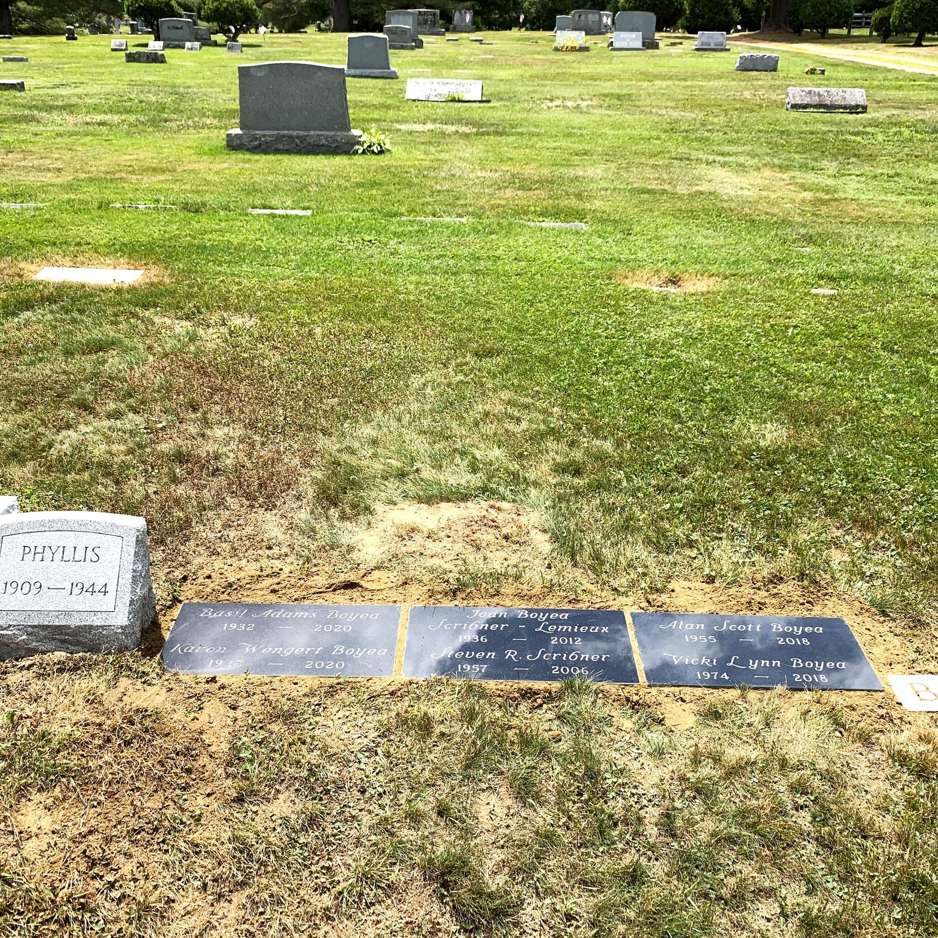 Three grassmarkers installed by Champlain Monuments