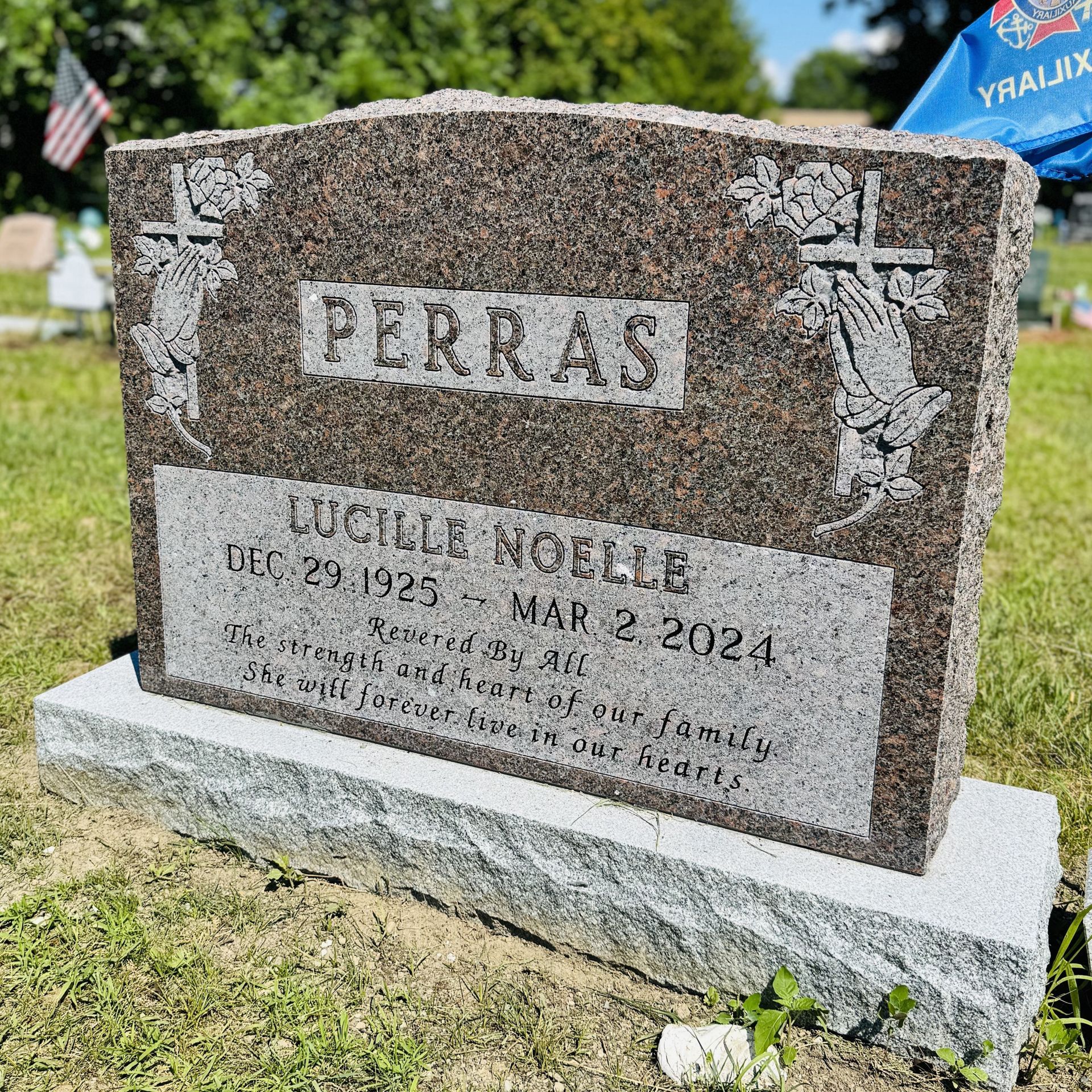 Custom headstone from Champlain Monuments.