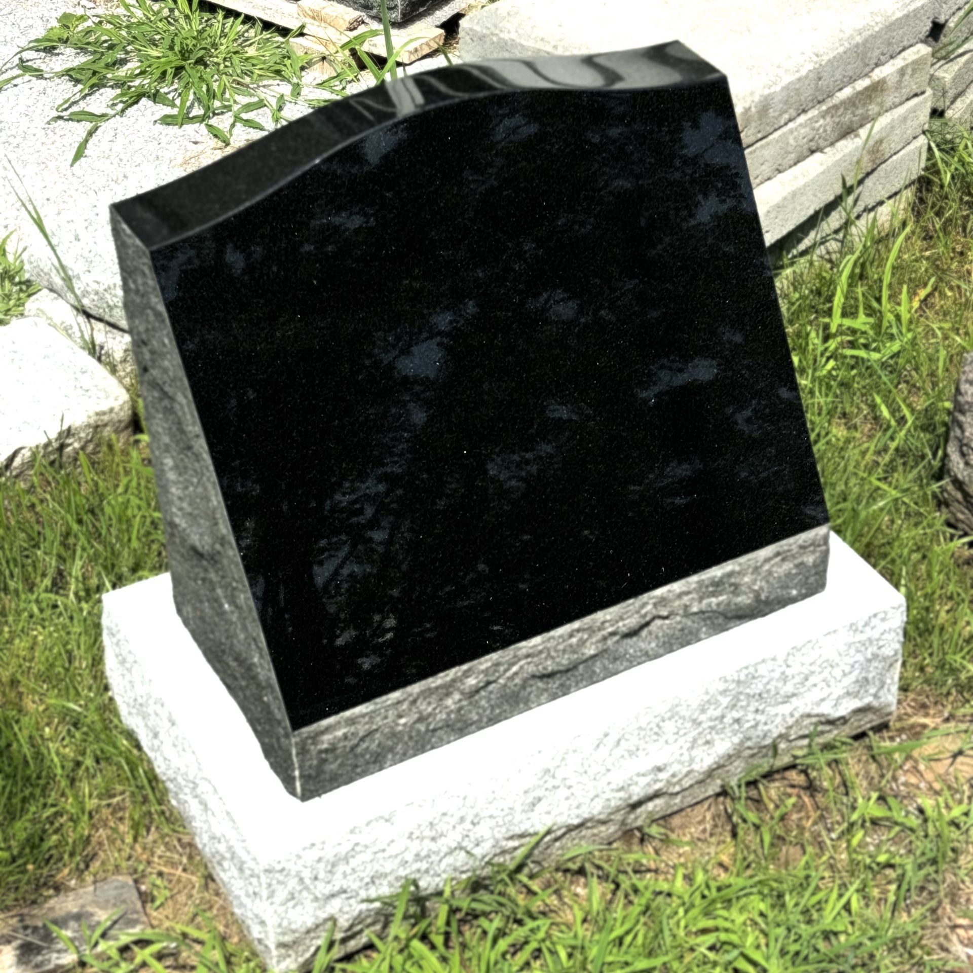 granite slant monument installed by Champlain Monuments