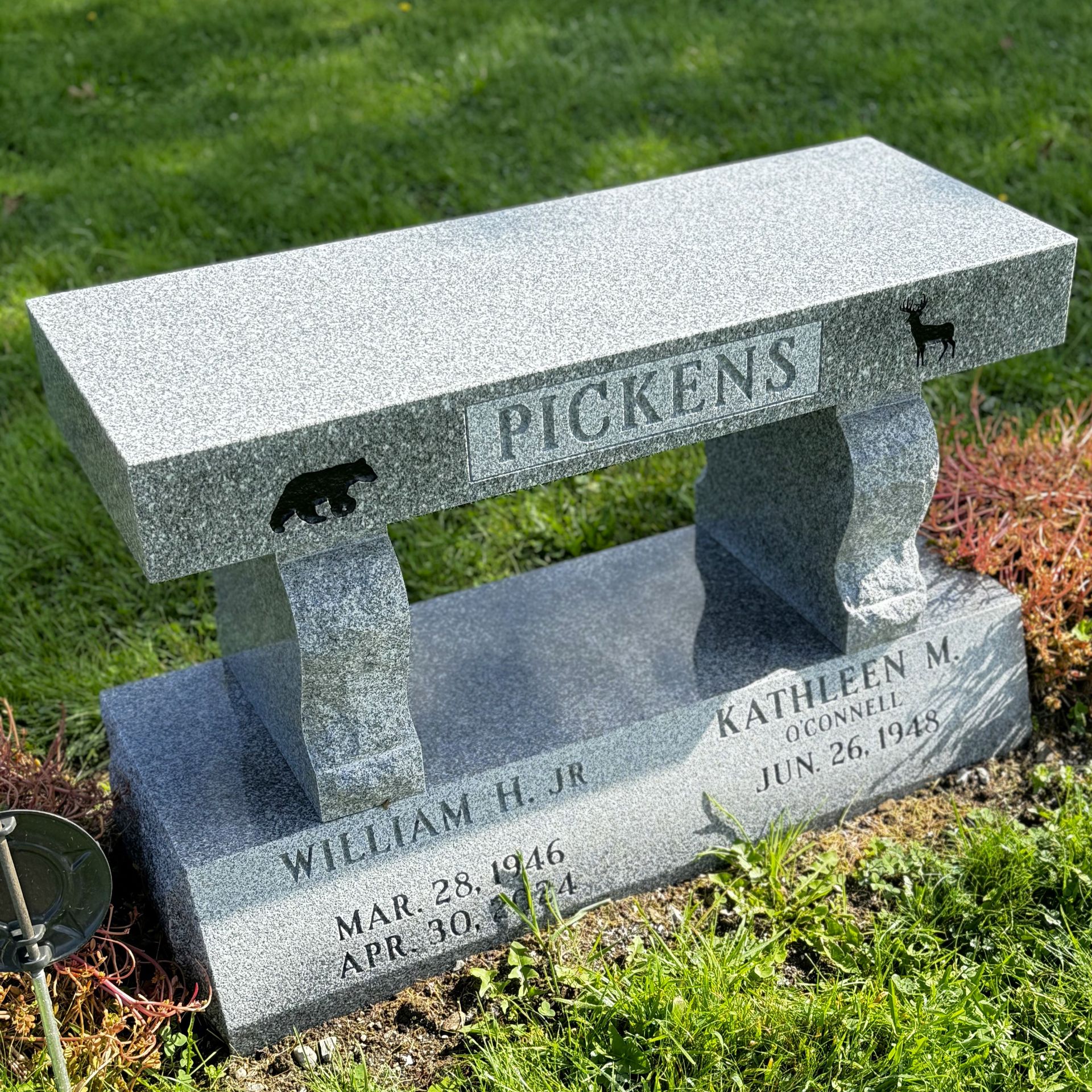 Custom granite bench installed by Champlain Monuments.