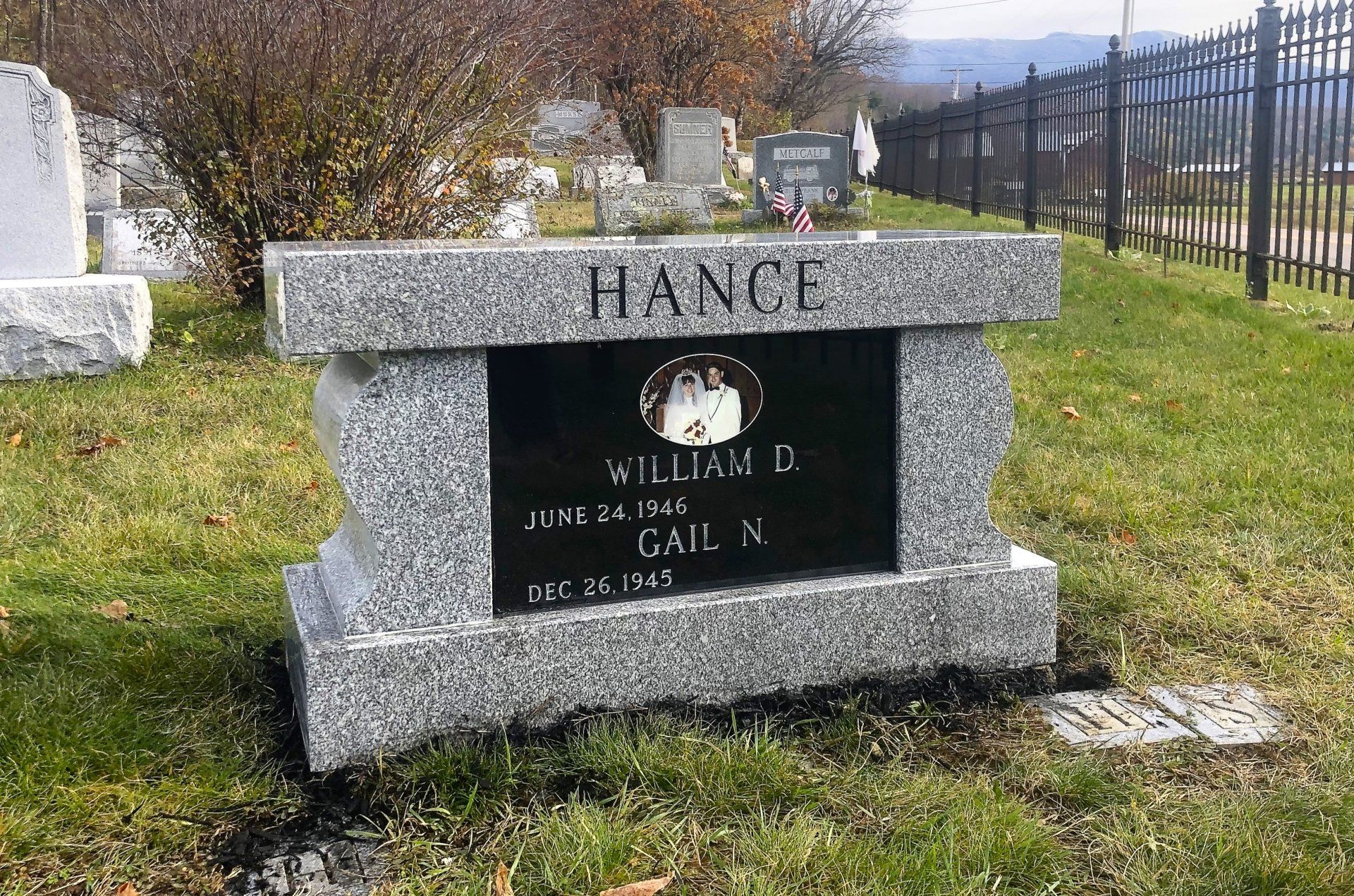 a cremation bench in Underhill Vermont installed by Champlain Monuments.