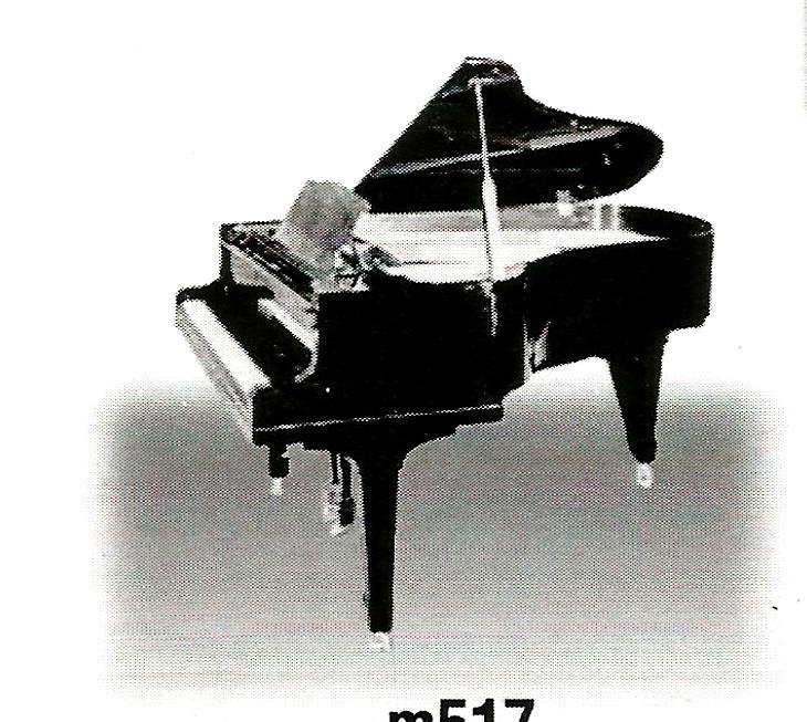 a black and white photo of a piano with the number mf17 on the bottom