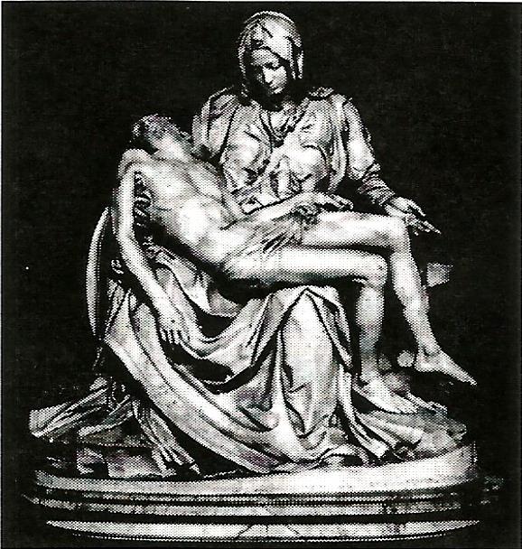 a black and white photo of a statue of a woman holding a corpse