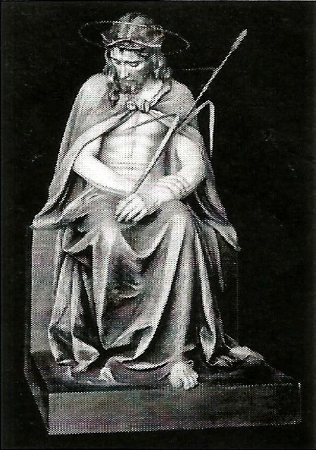 a black and white photo of a statue of jesus with a crown of thorns