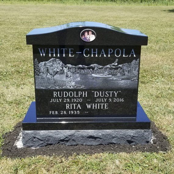 a cremation monument with etchings