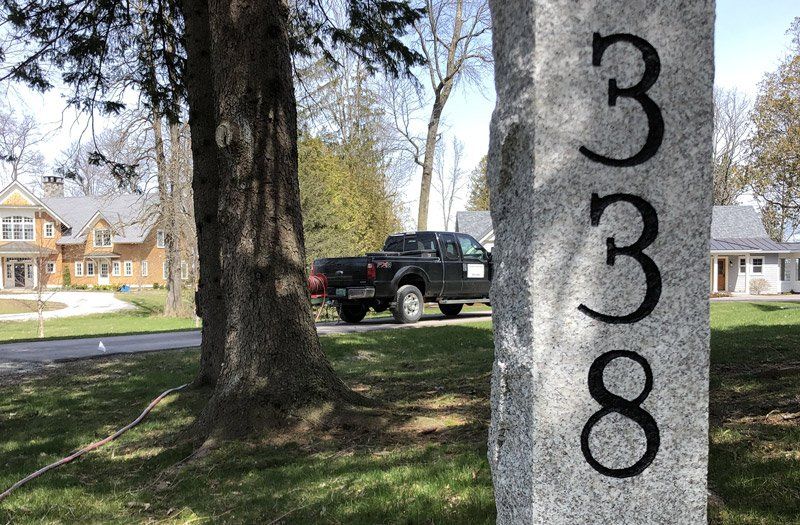 an engraved driveway post