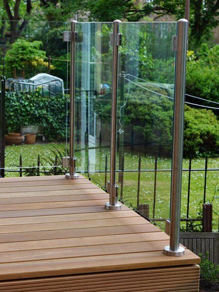 Solid Balau Decking topped with Frameless stainless steel and Glass balustrade for a touch of sophistication in the garden example 5