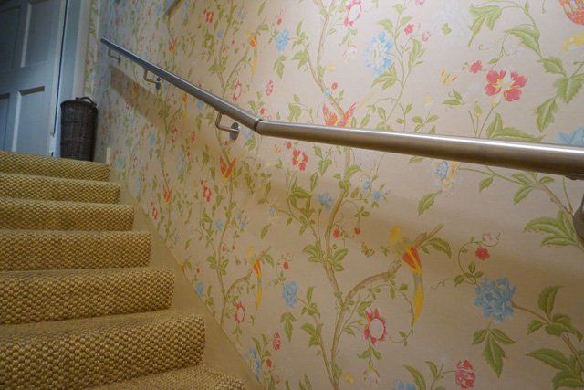 A last minute stainless steel handrail custom made and fitted to provide safe access to a basement flat example 4