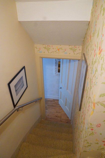 A last minute stainless steel handrail custom made and fitted to provide safe access to a basement flat example 6