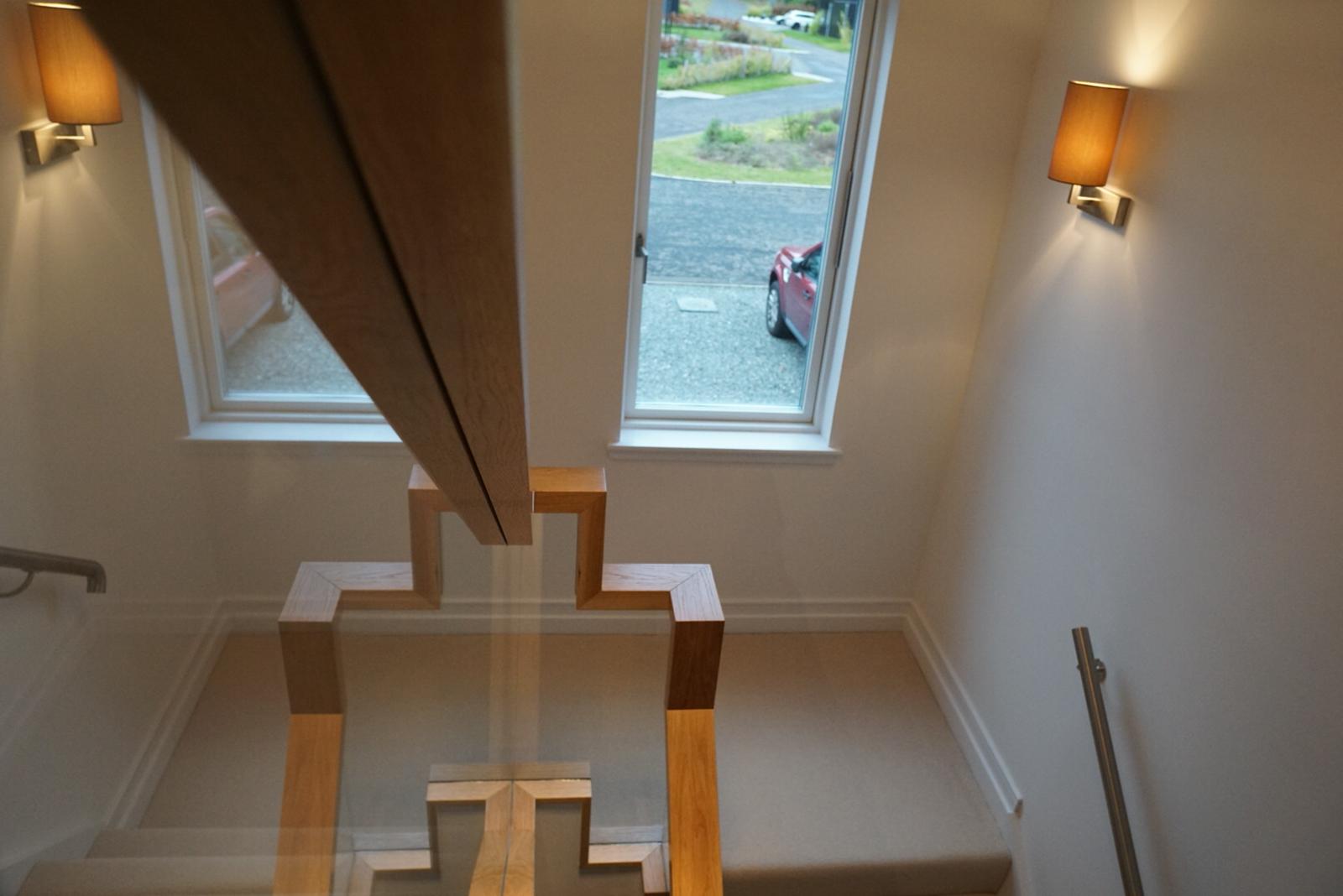 New glass balustrade with floating handrail example 4