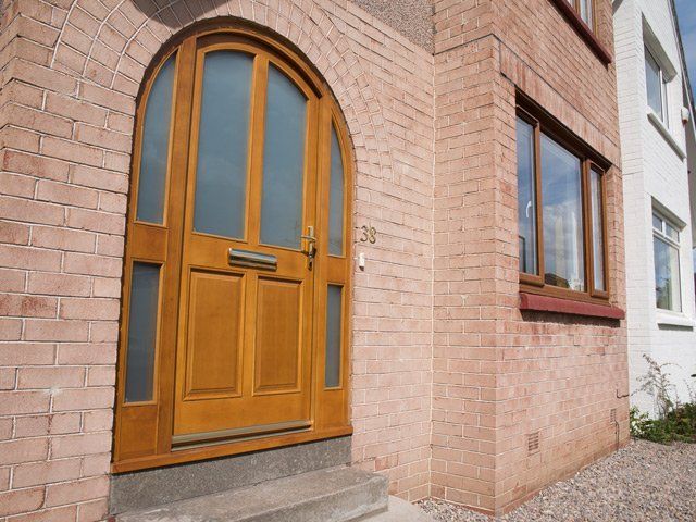 Custom made arch top door