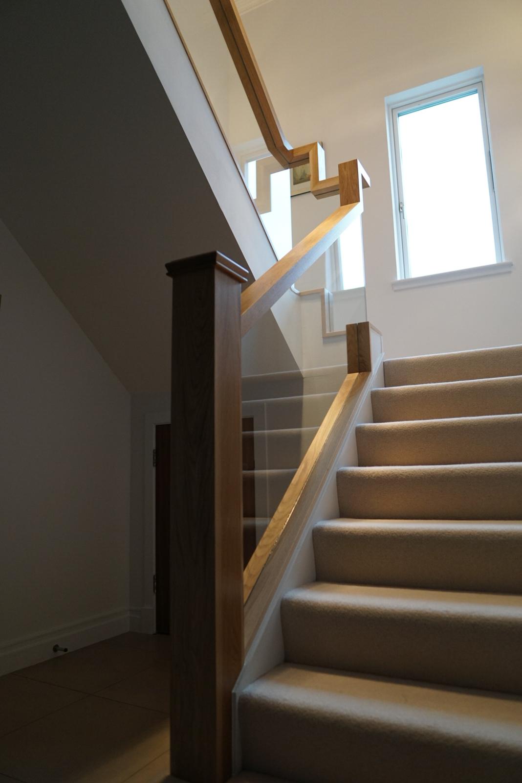 New glass balustrade with floating handrail example 6