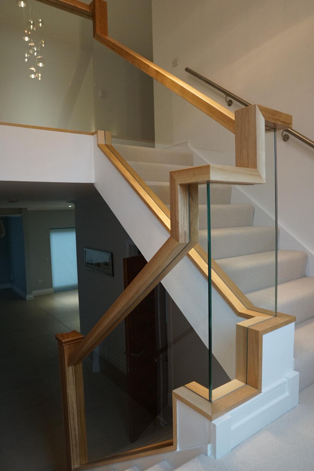 New glass balustrade with floating handrail example 7
