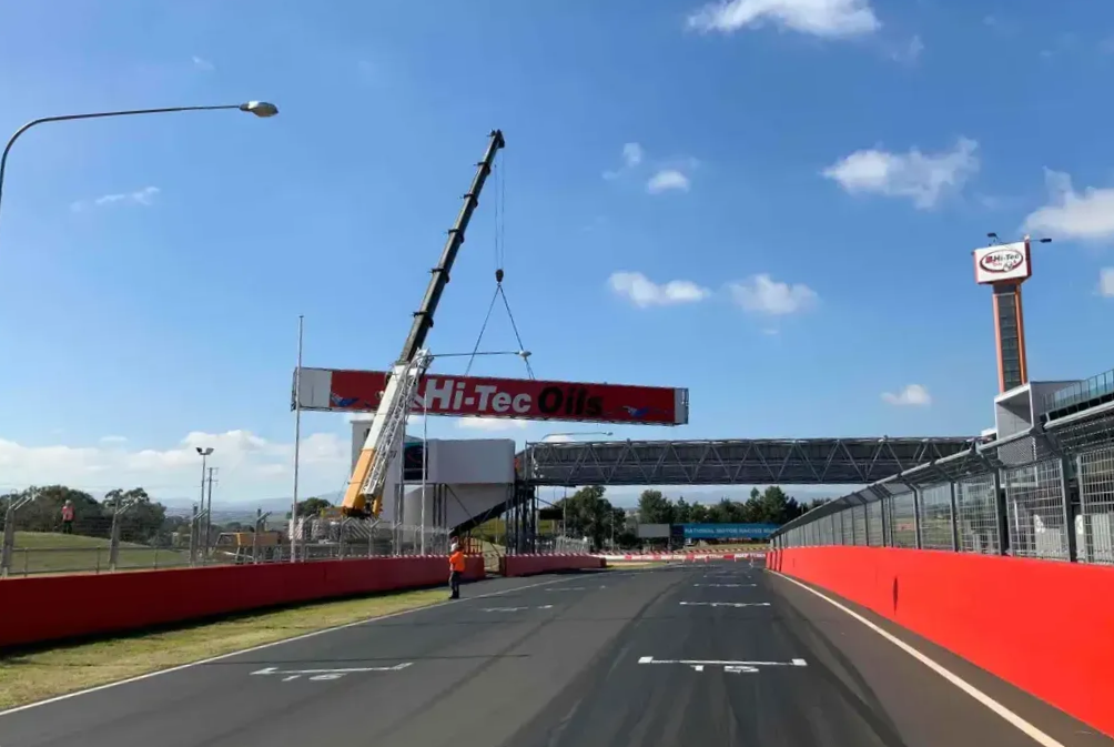 Crane installing a banner — Chris Horton Manufacturing in Bathurst, NSW