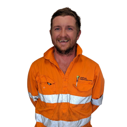 A man with a beard is wearing an orange safety shirt