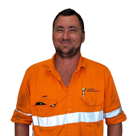 A man wearing an orange shirt