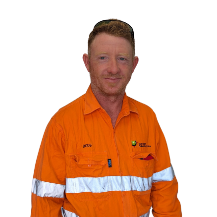 A man wearing an orange shirt with the name doug on it