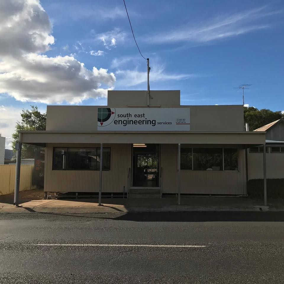 A building with a sign that says south east engineering