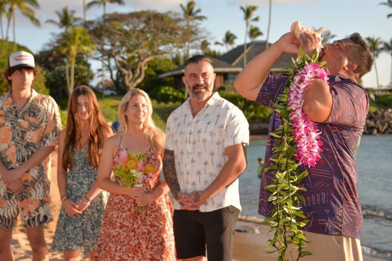 group having fun on beach