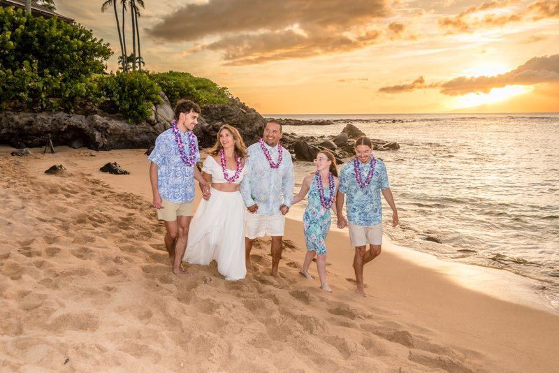 group on beach at sunset