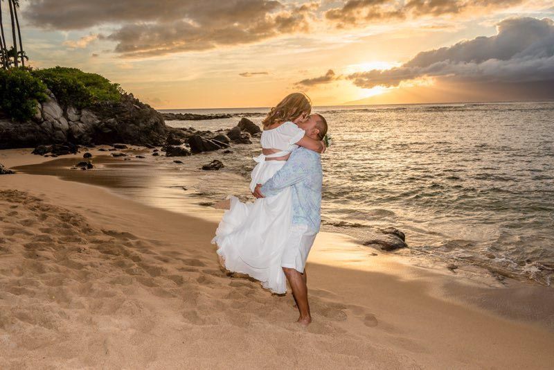 couple on beach at sunset